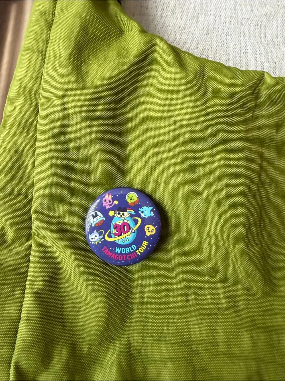 Tamagotchi button sdcc
